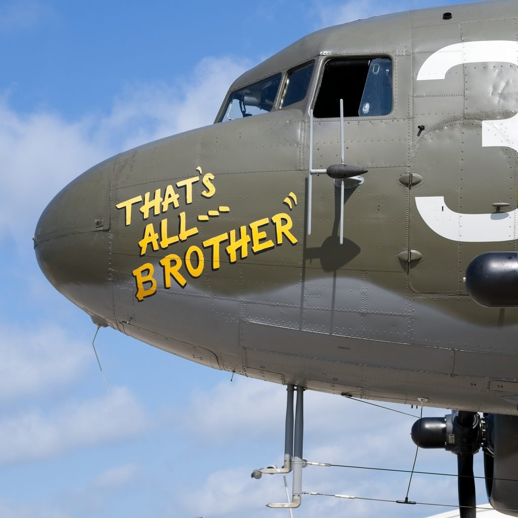 Close-up of the C-47 That’s All, Brother, showing antennas and other equipment along the underside of the aircraft.